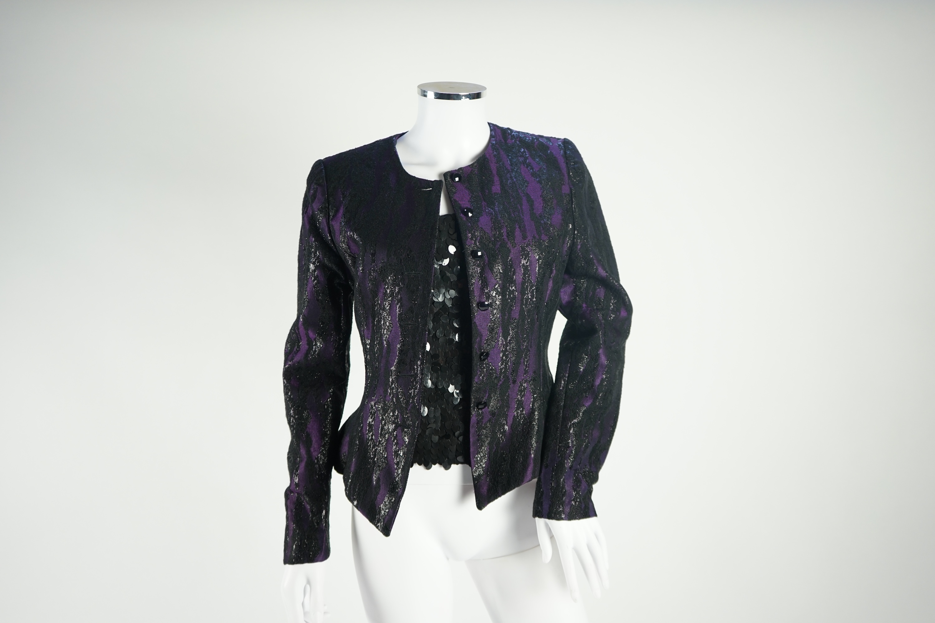 A lady's Boss (Hugo Boss) metallic purple and black evening jacket, three black skirts (Alexander McQueen, Emporio Armarni and Versace Classic) and a black sequin Ben de Lisi vest top, all approx. size 10